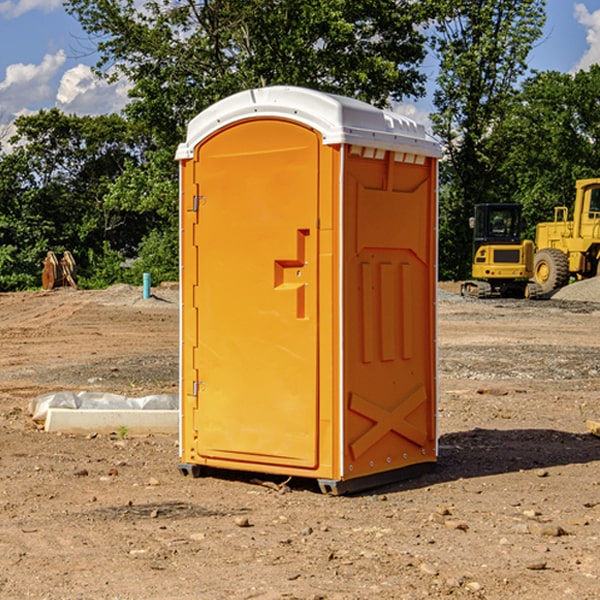 how often are the portable toilets cleaned and serviced during a rental period in Wheelwright